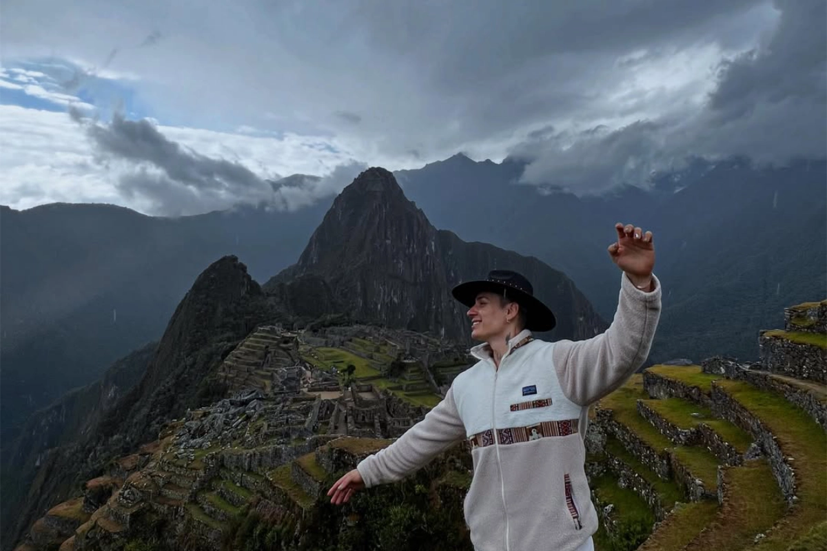 Traveler overlooking Machu Picchu