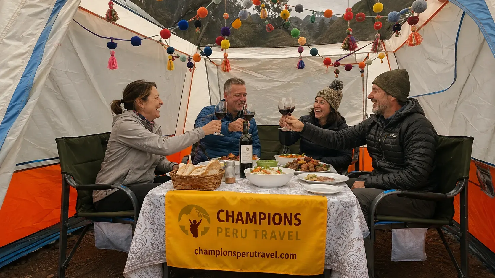 Travelers enjoying a meal and wine inside a camping tent during a Champions Peru Travel trek
