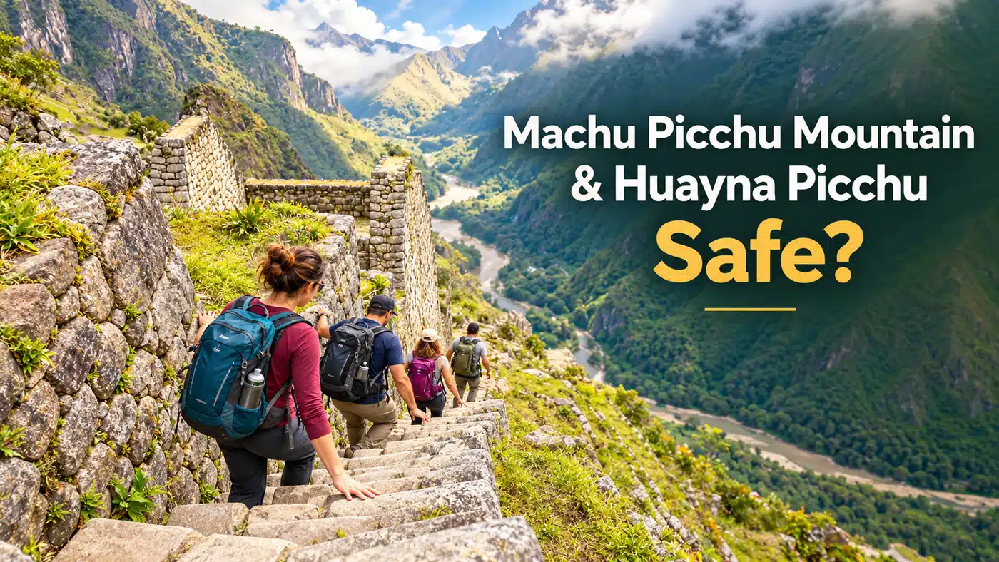 Tourists carefully descending steep stone steps along a mountain trail near Machu Picchu