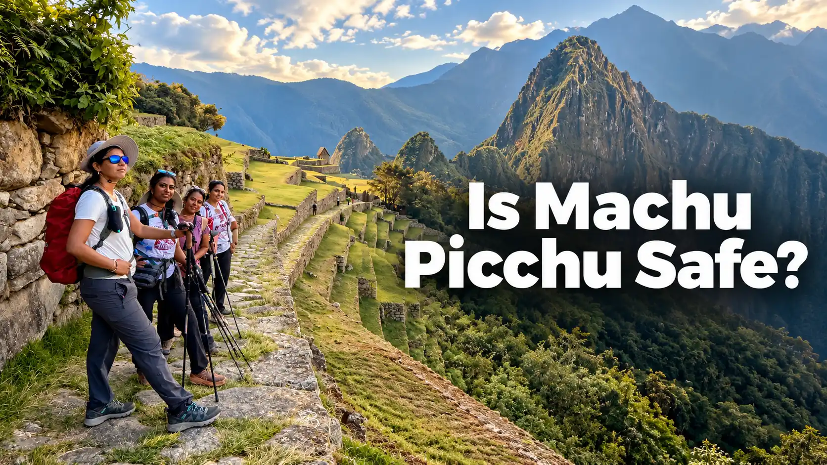 Group of tourists standing on a stone pathway overlooking the mountainous landscape surrounding Machu Picchu
