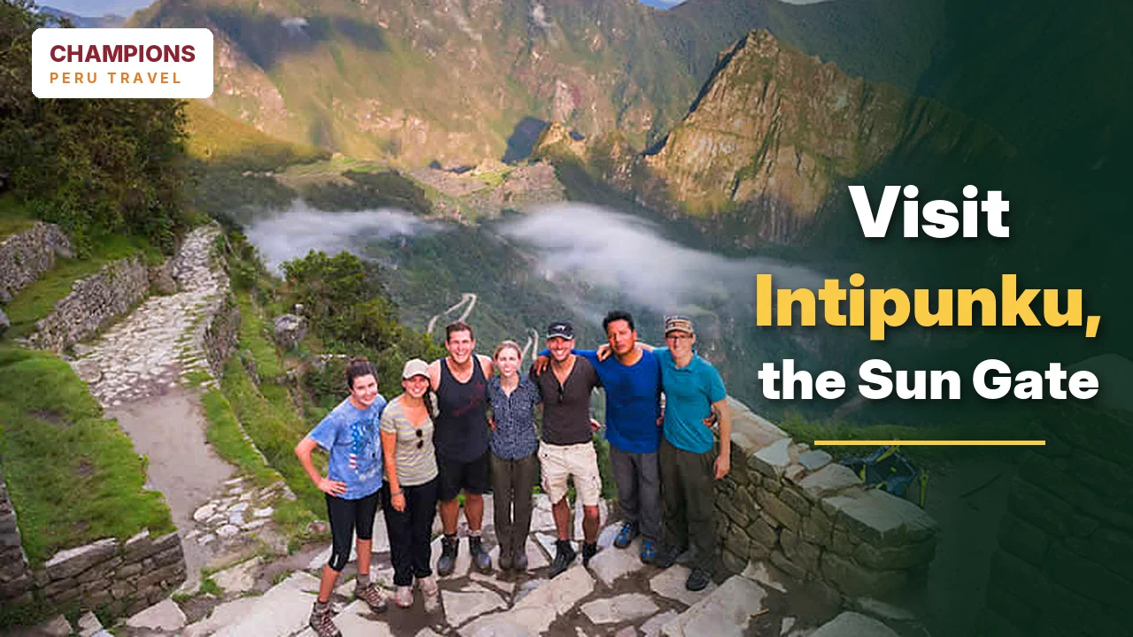 Group of hikers enjoying the scenic view of Intipunku Sun Gate along the Inca Trail to Machu Picchu.