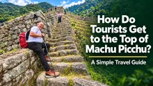 Tourist resting on ancient stone steps while hiking toward the top of Machu Picchu in Peru.